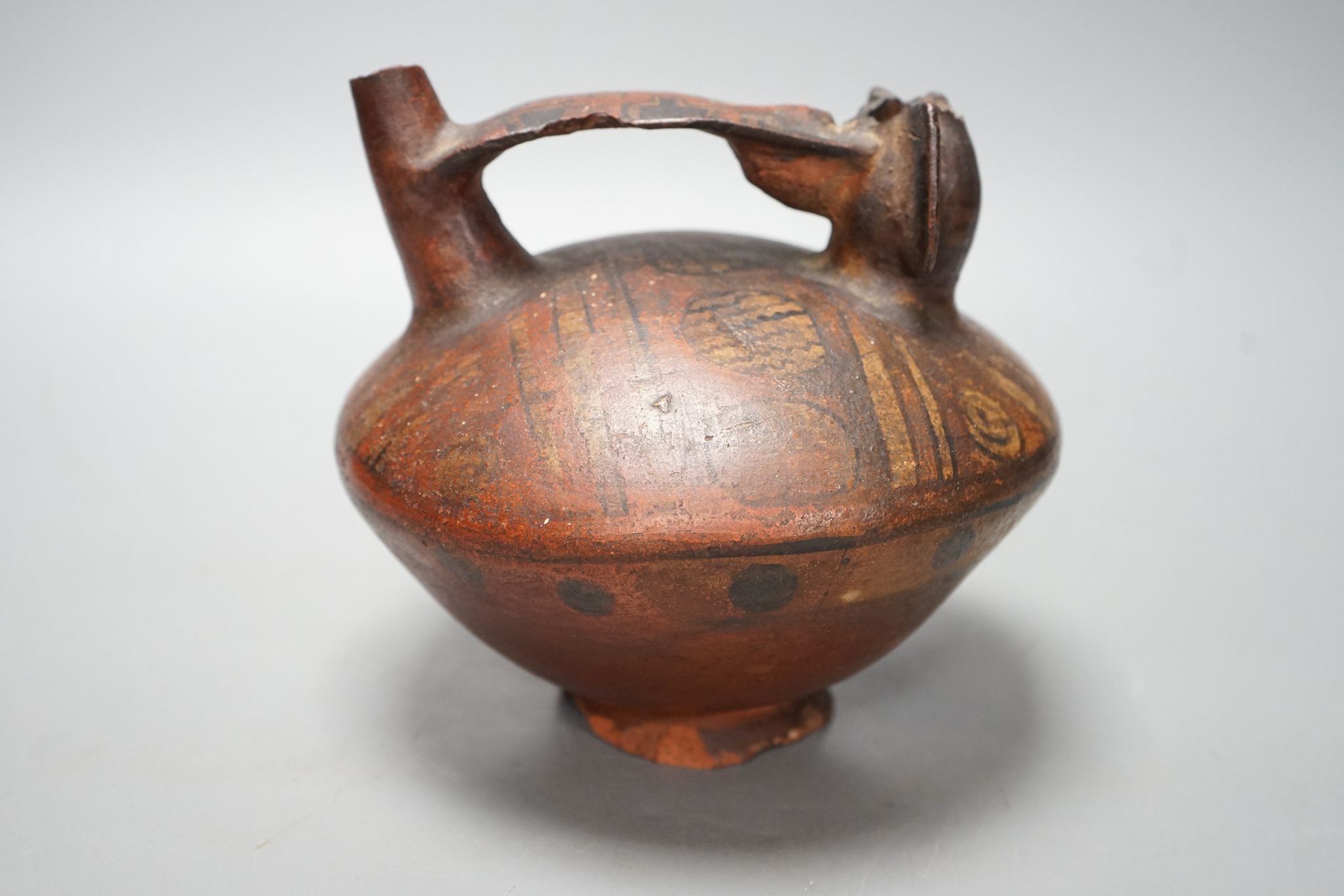 A pre-Columbian painted pottery vessel 17cm